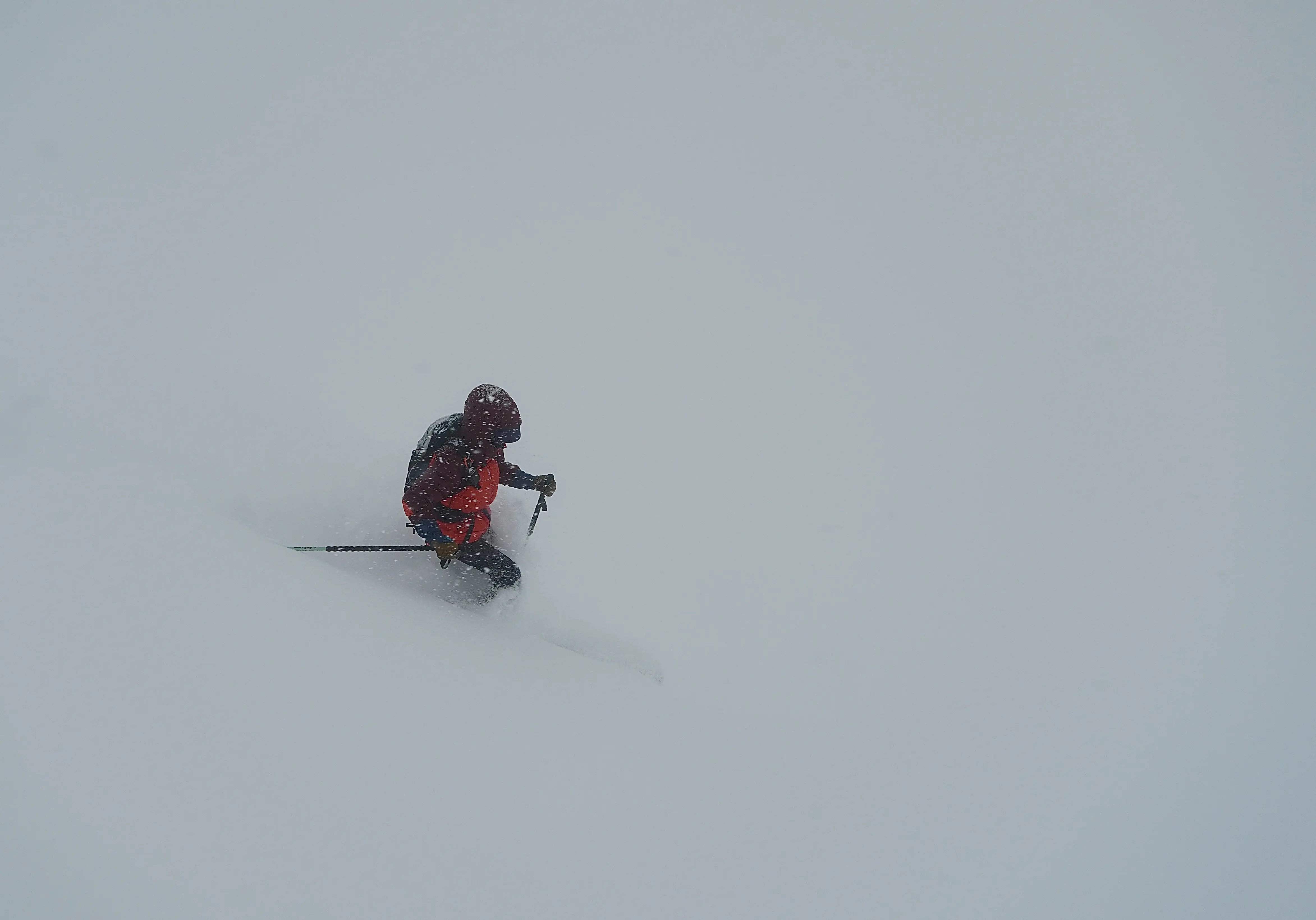 Jordan Evans shredding in whiteout conditions on Heaven's Halfpipe. Wasatch, Utah. Photographed by Shane Haynes